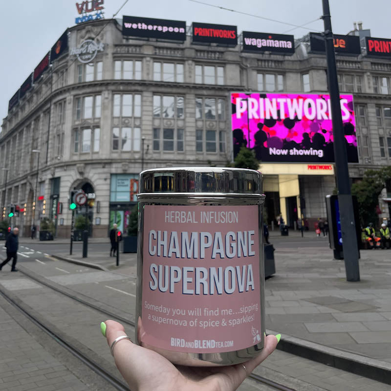 champagne supernova tea tin in town