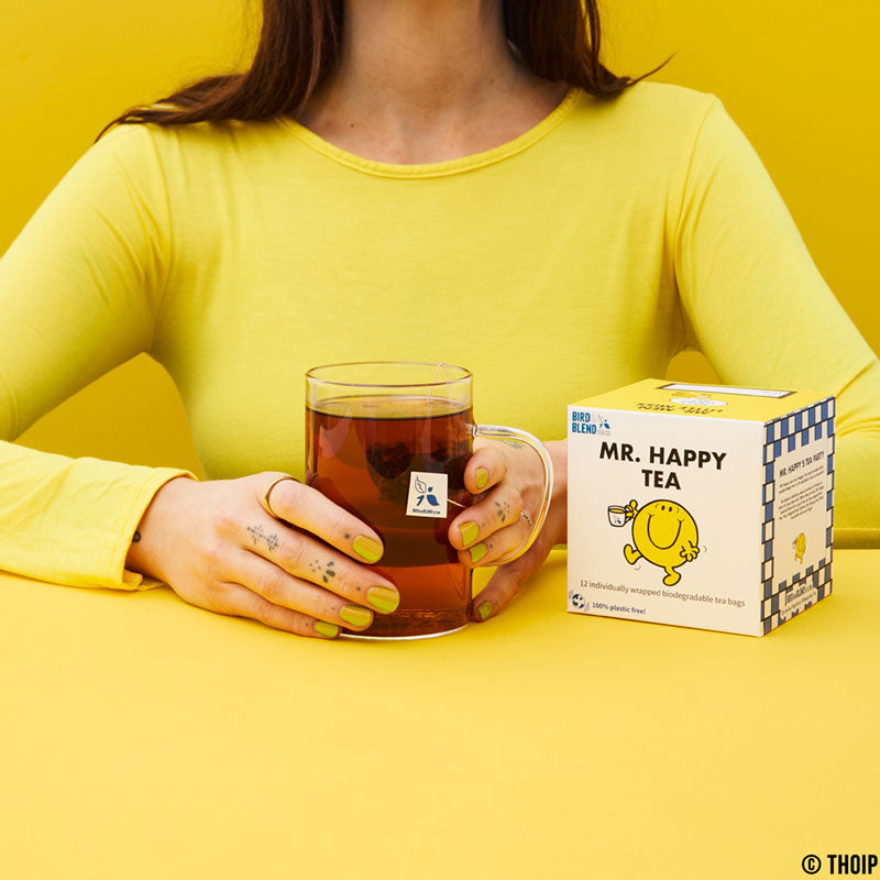 mr happy tea cube with hot tea